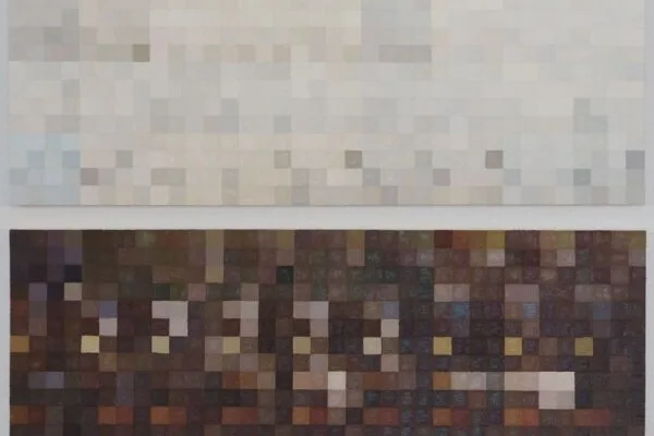 Two paintings one light one dark with rows of painted squares in shades of gray and brown.